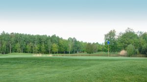 blue skies green grass tress at blainvillier golf